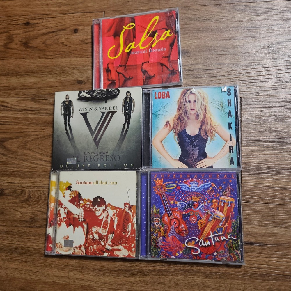 Lot of 5 Latin CDs Shakira Loba Santana Supernatural Wisin Yandel Los Vaqueros